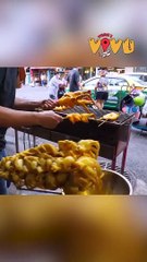 Mực sốt cay nướng than hoa trên đường phố Thái Lan