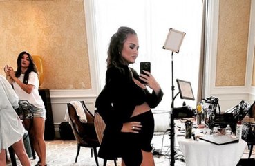 Chrissy Teigen says she hates the "in-between stage" of pregnancy