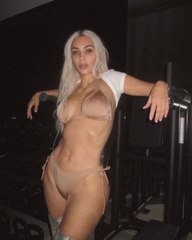 Kim Kardashian Does  Gym Time  in a String Bikini and Thigh High Boots