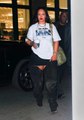 Rihanna Just Passed Off Her Denim Thigh-High Boots as Pants