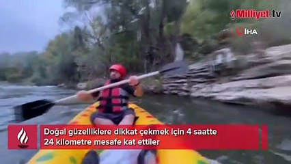 Şaşkın bakışlar arasında ilçeyi kanoyla geçtiler