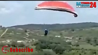 Chilling second paraglider on follow run plummets 130ft to his death after spinning mid-air