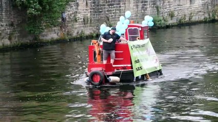 'We're trying to get their attention': Peanut butter brand sails along River Aire in Leeds in plea to Asda bosses