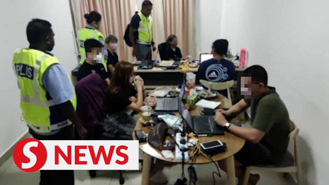 Cops raid scam syndicate's call centre in Jalan Klang Lama condo