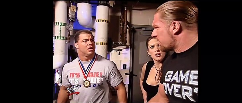 Triple H, Stephanie Mcmahon and Kurt angle backstage