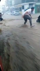 Aguaceros obligan a cambiar sede acto de Abinader