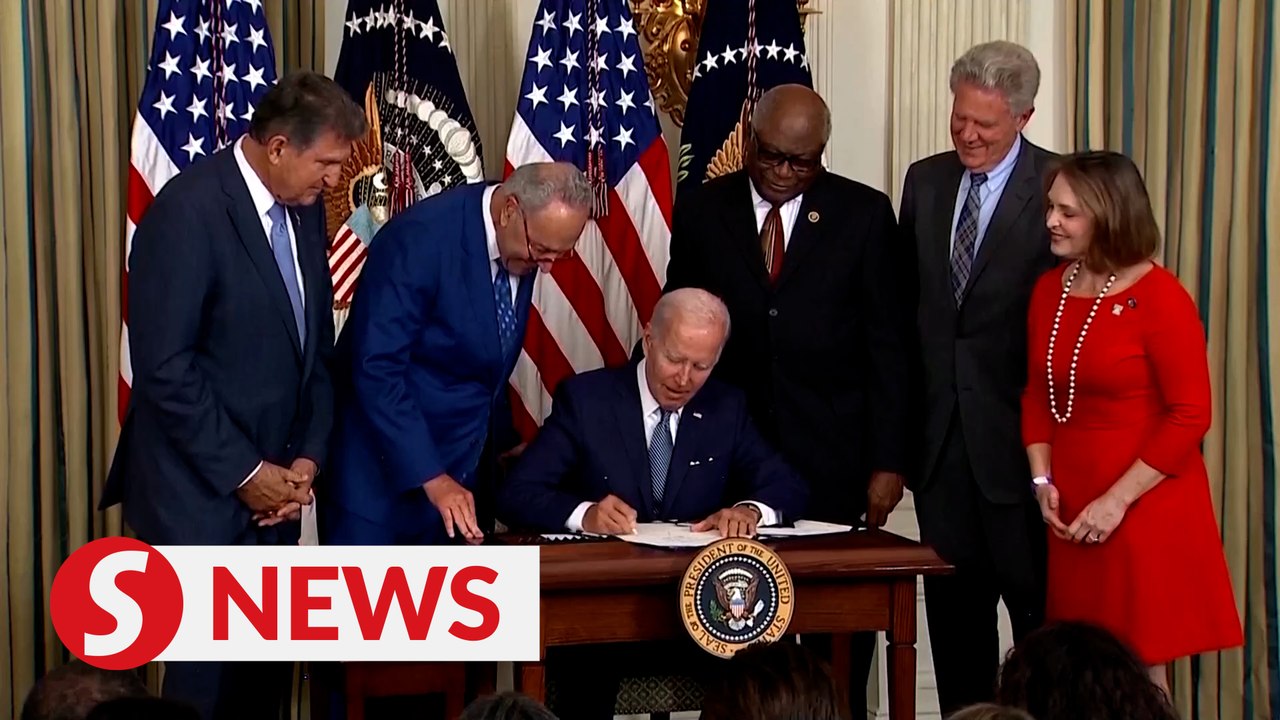 Biden signs inflation act as Democrats plan ad blitz