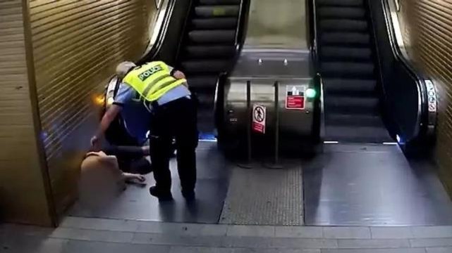 Yürüyen merdivene ters binen hırsız polis tarafından yakalandı