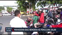 Mahasiswa Bagikan Ratusan Bendera Merah Putih Ke Pengendara