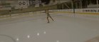 Professional Figure Skater Performs Spectacular Dance Moves in Rink