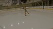 Professional Figure Skater Performs Spectacular Dance Moves in Rink