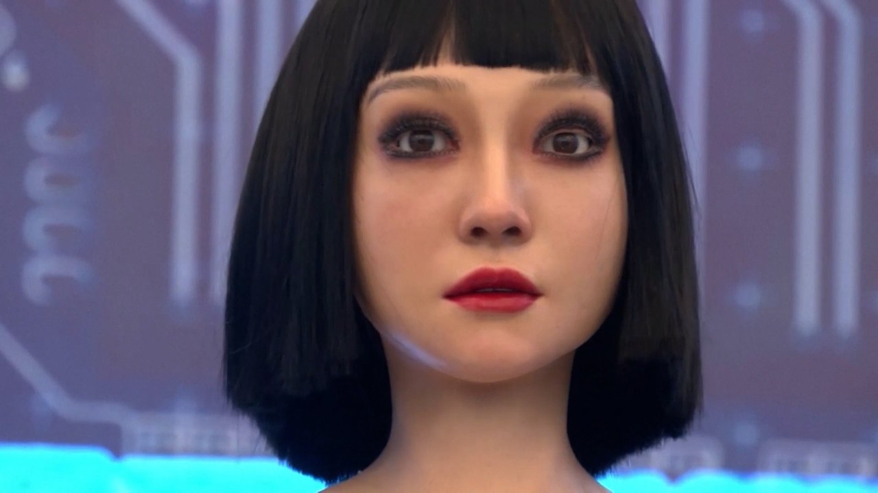 Humanoid machines read faces, emotions at World Robot Conference in Beijing