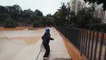 Duo Smoothly Rides Their Skateboard at Skatepark
