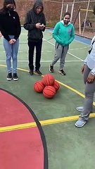 Mesmerizing Stack of Basketballs Roll Together