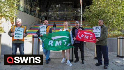 Rail workers begin strike on the picket line outside Birmingham New Street station.