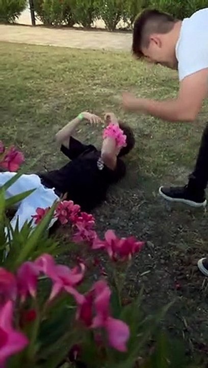 Guy Misses Tackle on Friend and Falls Through Bushes
