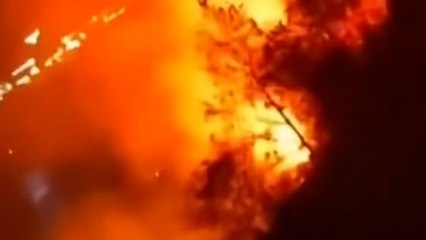 Wildfires scorch mountainside in southwest China as record heat and drought continue