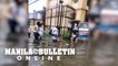 Students in Hagonoy, Bulacan had to brave through flood during the first day of classes