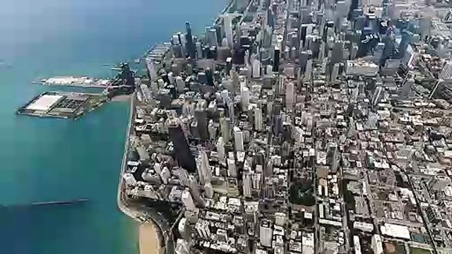 U.S. Army Parachute Team fly their parachutes in Chicago