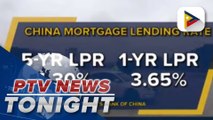 China cuts mortgage lending rate anew amid property crisis