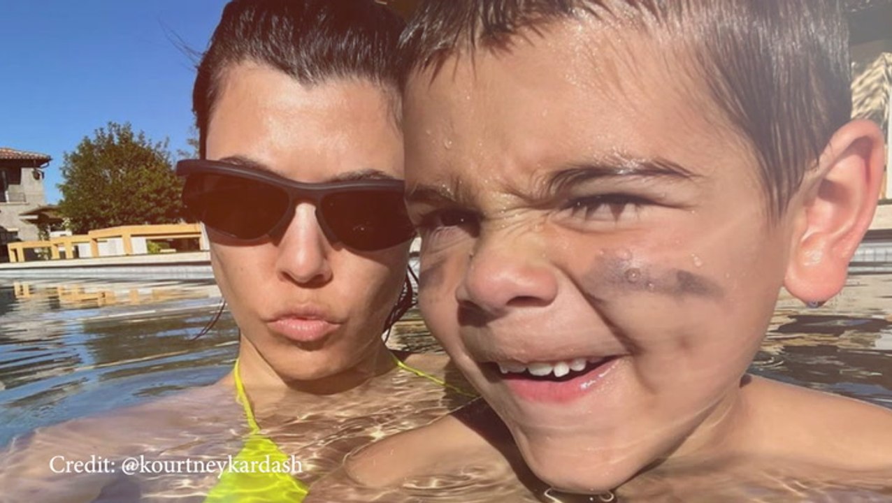 Kourtney Kardashian Rocks A Yellow Bikini As She Takes A Dip With Son Reign