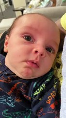 Baby Startled by Daddy's Strange Laugh