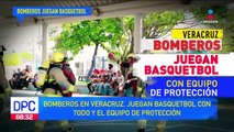 Bomberos juegan basquetbol con su equipo de protección en Veracruz