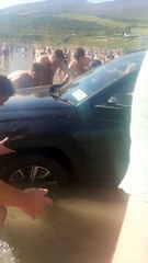 Car Gets Stuck on the Beach