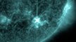 Double solar m-flares blast massive coronal mass ejection