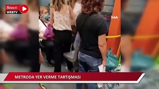 Metroda yer verme yüzünden çıkan tartışma kameralara yansıdı