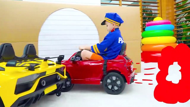 Chris saves toy cars from a box - fire truck, an ambulance and police