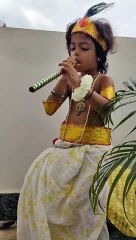 Natkhat Kanha playing flute