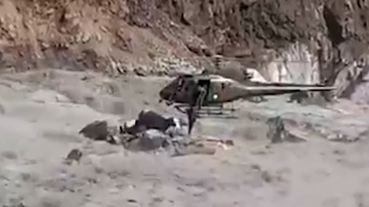 Chopper rescue for man trapped in a torrent as death toll from Pakistan floods crosses 1,000