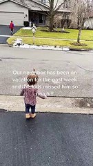 Kids welcome back their favorite neighbor after vacation