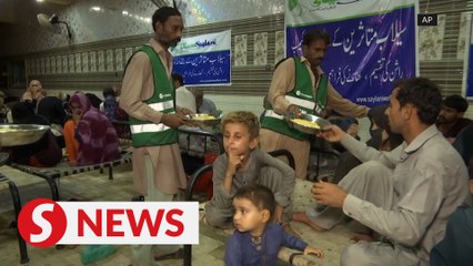 Pakistan charity provides free food to flood victims