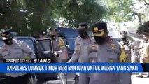Pemberian Bansos oleh Kapolres Lotim kepada warga Dusun Tanjong Desa Dadap Kec. Sambelia Kab. Lotim