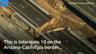 California freeway split in half by monsoon floodsClose