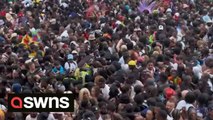 Notting Hill Carnival crowds seen screaming and forced to climb over gates as thousands packed into one road with no space