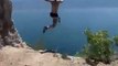 Guy Jumps Off High Cliff and Dives Into Water