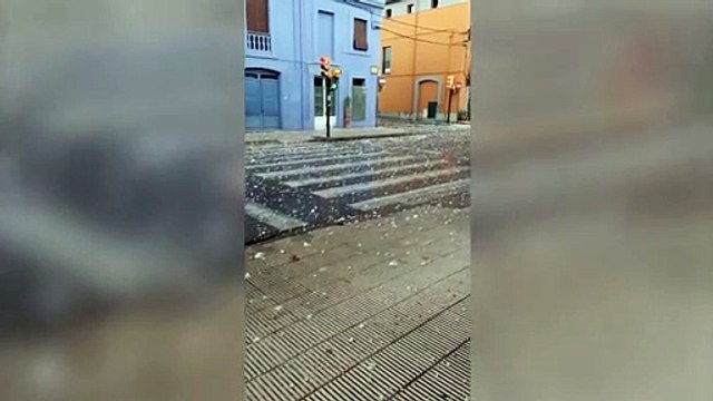 Child dies and more than 40 injured as giant hailstones the size of peaches batter Catalonia town