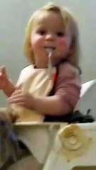 Adorable toddler loves getting messy during food time