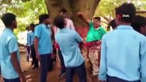 Düşük not veren öğretmenlerini döverek ağaca bağladılar