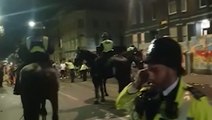 Moment police horses collapses and dies 