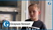 Eight-year-old hero Grayson Stewart called 999 when mum passed out