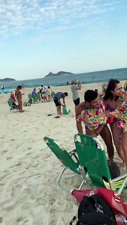Morning Glory Cloud Passes Over Brazilian Beachgoers