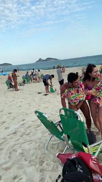 Morning Glory Cloud Passes Over Brazilian Beachgoers