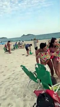 Morning Glory Cloud Passes Over Brazilian Beachgoers