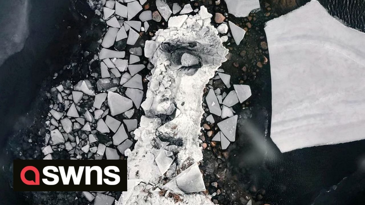 American artist braves Finland's freezing temperatures painting portraits on giant floating blocks of ice