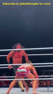 Matt Riddle powerbombs Seth Rollins through table then nails RKO #wwe #rko #sethrollins #mattriddle