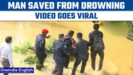 Bengaluru Rain: Drowning man rescued by security guards, video goes viral | Oneindia News *News